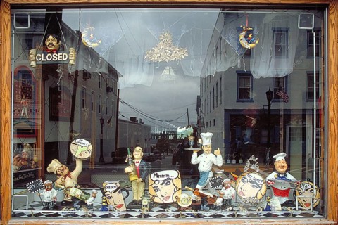 Shop window with cooking figures of all kinds, New York City, USA
