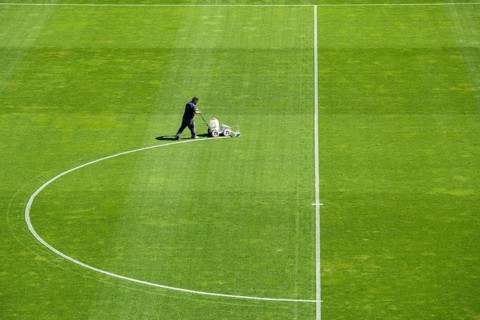 Painting line on a soccer pitch