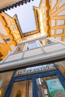 View from below of the entrance to a yellow half-timbered museum, Sindelfingen, Böblingen district,