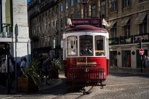 LISBON, PORTUGAL - MAY 20, 2025: Famous old tram at the street of the city