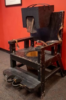 St. Joseph, Missouri - A tranquilizer chair from the 18th century on display at the Glore