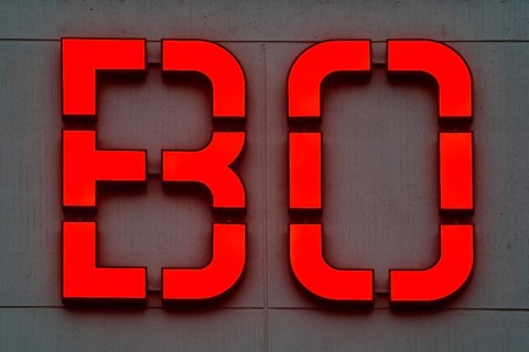 Detailed view of the red BO logo in the evening at the main building of Bochum University, Ruhr