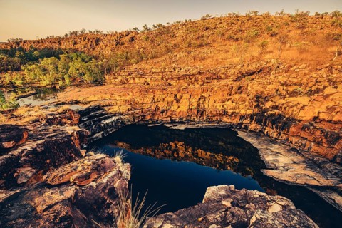 Bell Gorge waterfall, a body of water in north-west Australia in the Kimberley. Sunrise in the