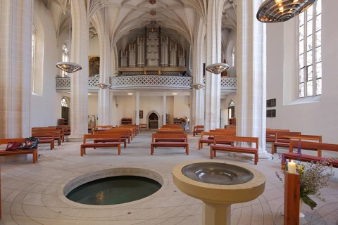 Interior view with baptismal font and chancel, late Gothic St. Petri Pauli church - baptismal