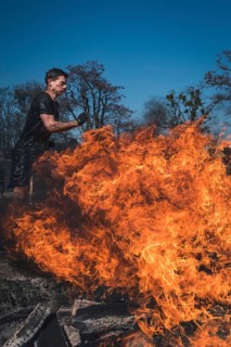WROCLAW, POLAND - APRIL 7, 2018: Extreme running with obstacle RUNMAGEDDON. In the picture a runner