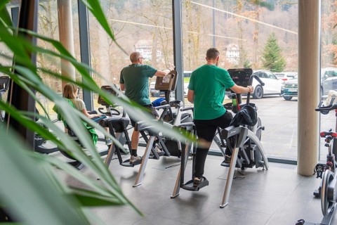 People working out on exercise bikes with a view of the outside, Fitness TSV Calw, Germany