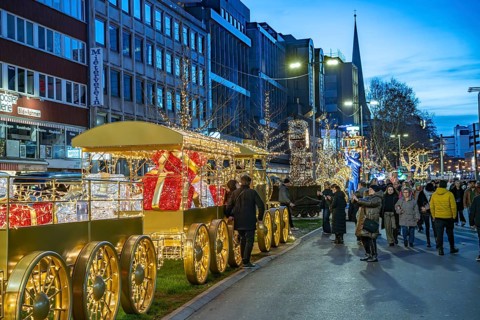 Locomotive light installation at Dortmund's Christmas market at dusk, Dortmund, North