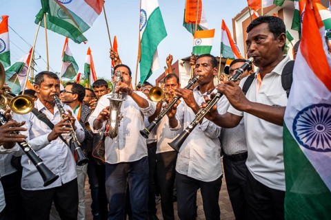 Band members play music as they take part in a rally, in soliderity with the Indian armed forces in