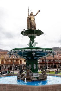 King of the Incas Pachacutec over fountain in Plaza de Armas, Cusco, Peru