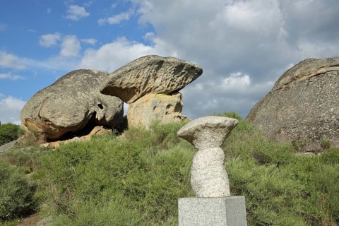 Rocky landscape with mushroom and duplicate, mushroom-shaped rock formation and stone sculpture,