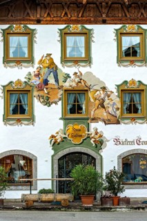 Typical Lüftl painting with rural scenes on a house in Wallgau, Werdenfelser Land, Upper Bavaria,