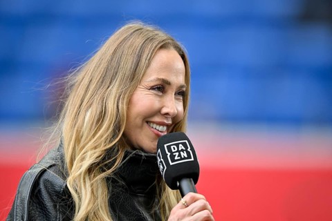 DAZN presenter reporter Sylvia Walker, portrait in interview microphone micro logo smiling,