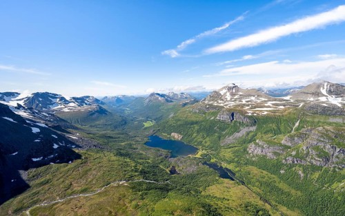 View from the summit of Innerdalstårnet of mountainous landscape, Innerdalen high valley and lake