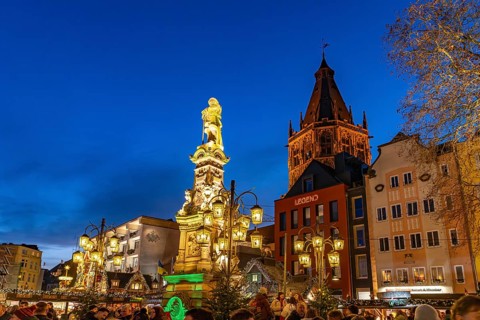 Christmas market Heinzel's winter fairy tale on Jan von Werth-Brunnen at dusk, Alter Markt,
