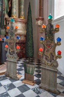 On contour-cut and painted boards with religious motifs in front of the altar during Lent,