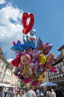 Colourful balloons for sale at a town festival in Forchheim, Upper Franconia, Bavaria, Germany