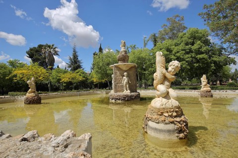Fountains and cherubs with fish, park, Parque de la Legion, Badajoz, Extremadura, Spain