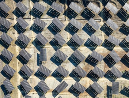 Rows of solar panels at a photovoltaic plant near Vejer de la Frontera. Aerial view. Drone shot.