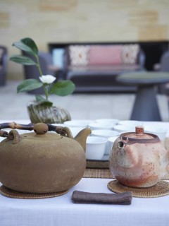 Terracotta teapots on the table for traditional tea service