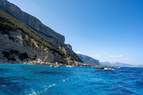 Picturesque rocky coast, cliffs and blue sea, Golfo di Orosei, Baunei, Sardinia, Italy