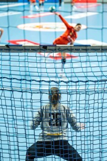 Detail of handball goal crossbar with net penalty shot in the background