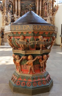 Baptismal font from 1539 with relief of a children's round dance by J¸rg Diener, in the church of