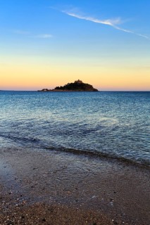 St Michael's Mount, tidal island with castle, evening sky, single cirrus, Marazion, Cornwall,