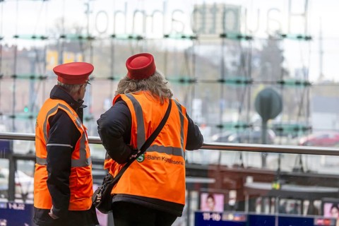 Berlin Central Station. S-Bahn account manager wearing uniform and safety vest. Berlin, Germany