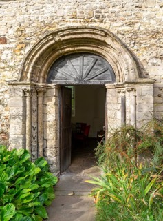 Historic arched doorway church of Saint Peter, Cambridge, Cambridgeshire, England, UK