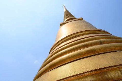 Bangkok, Thailand. February 20th 2025. The distinctive Buddhist architecture of the golden stupa or