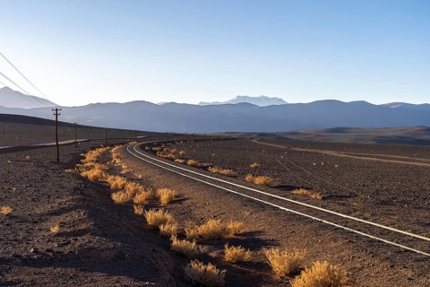 Captivating view of railroad tracks snaking through the desolate and scenic landscape of La Puna in