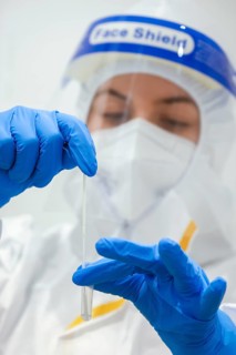 Cologne, North Rhine-Westphalia, Germany - Covid rapid test at the Medicare test centre, swab on