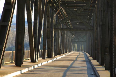 Double-headed bridge with road across the Moselle, metal structure, steel girders, rivets, struts,