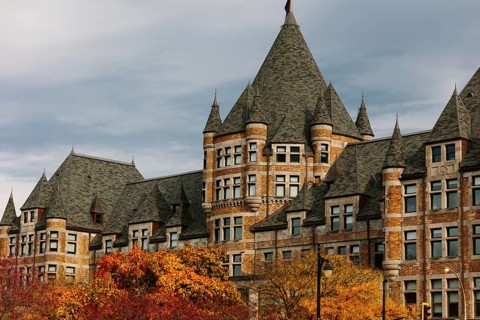 Fall colors complement the historic architecture in Montreal, Quebec, with vibrant leaves and a