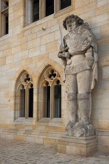Roland am Rathaus, large stone sculpture with sword and coat of arms, Halberstadt, Harz,
