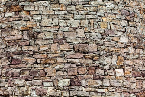 Old walls built with red sandstone from the Weserbergland, Krukenburg Castle, Helmarshausen, Bad