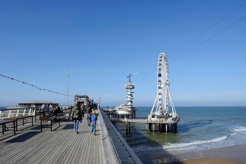 Pier with bungy jumping tower and Ferris wheel, Scheveningen, The Hague, Dutch North Sea Coast,