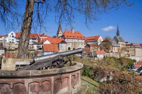 The Fügeler cannon on the castle rondel with panoramic view over medieval town of Warburg