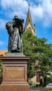 Luther memorial based on a design by Fritz Schaper in front of St Gregory's Merchant Church on the