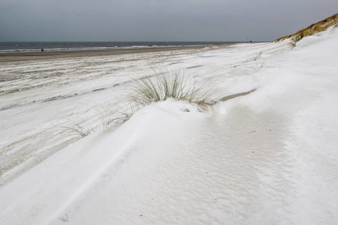 Snow-covered dunes on the North Sea beach, Langeoog, Lower Saxony, Germany