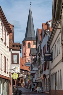 Protestant late Gothic town church, bell tower, alley, shopping alleyway, Neutorstraße, historic