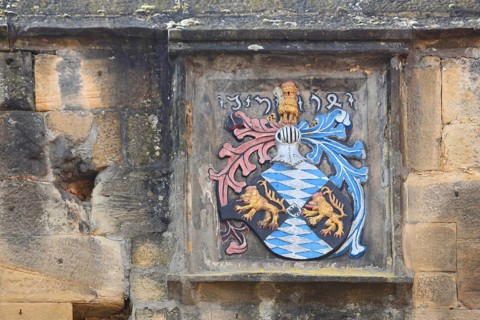 City coat of arms with date at Eisentor, Freinsheim, Rhineland-Palatinate, Germany