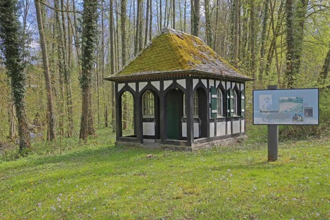 Pumping station, small house in the forest and information board, idyll, mossy, half-timbered