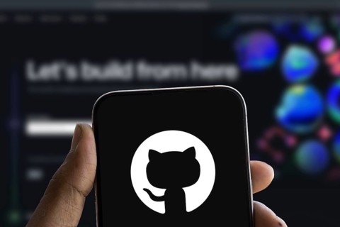 github logo is displayed on smartphone. GitHub is a proprietary developer platform