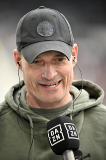 Coach coach Alexander Blessin FC St. Pauli portrait in interview microphone micro logo DAZN soccer