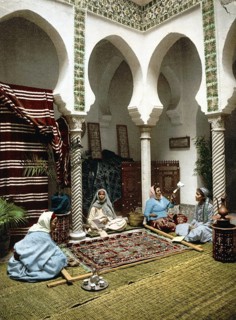 Moorish woman making Arabian carpets, Algiers, Algeria, ca 1890, Historical, digitally restored