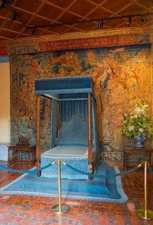 Magnificent room with sky-blue bed and ornate tapestries, bedroom of Diana of Poitiers, Chenonceau