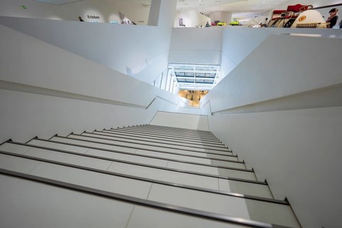 Modern staircase in bright light with stylish architectural design, Porsche Museum, Stuttgart,
