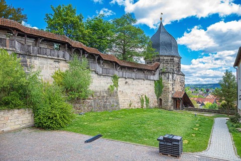 Historic town wall with battlements and witches' tower in Kronach, Germany