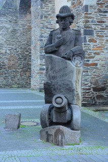 Funkennarrenbrunnen with cannon to commemorate and memorial of historic carnival, stone sculpture,
